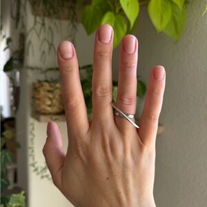 MAM silver-tone crossover ring (size 7) new with tags